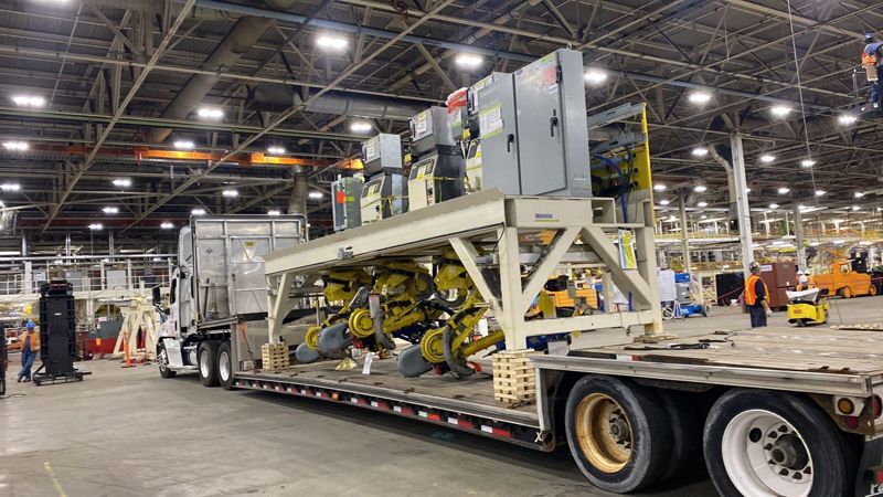 Tall machinery loaded on a Fission double drop trailer
